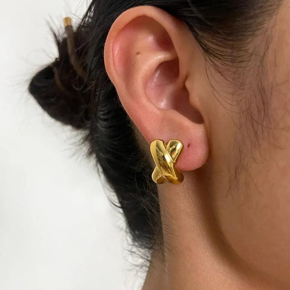 Ατσάλινα σκουλαρίκια little X σε ασημί χρώμα